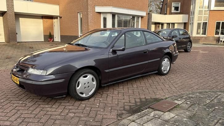 Paars Gebruikt 1996 Opel Calibra Basis Coupé | € 3.600 - Afbeelding 1/4