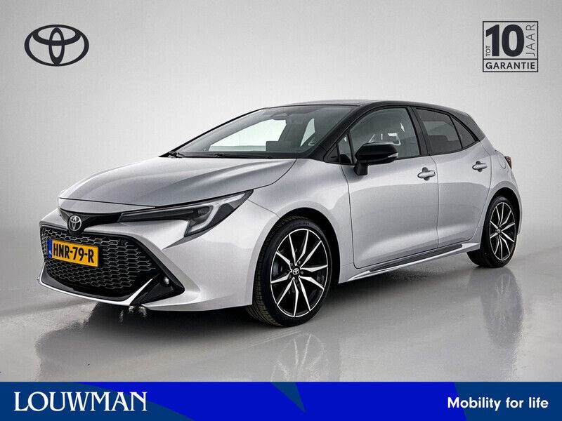 Grijs metallic Gebruikt 2024 Toyota Corolla Hybrid Sport Hatchback | € 34.950 (Iets duurder) - Afbeelding 1/3