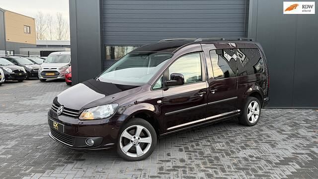 Paars Occasion 2013 VW Caddy Maxi Comfortline MPV | € 7.950 (Eerlijke prijs) - Afbeelding 1/4