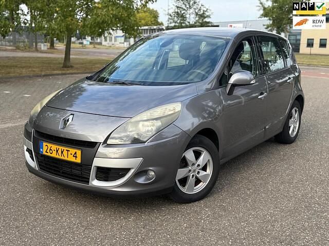 Grijs Gebruikt 2010 Renault Scénic III Dynamique MPV | € 3.950 (Eerlijke prijs) - Afbeelding 1/4