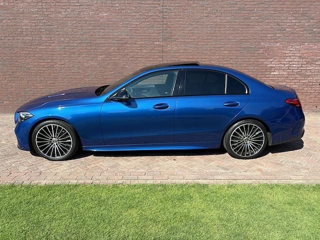 Occasion Mercedes C180 AMG 170 PK (125 kW) 2021 Blauw, metallic lak Sedan