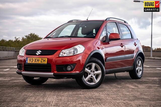 Oranje Gebruikt 2007 Suzuki SX4 Exclusive MPV | € 5.945 - Afbeelding 1/4