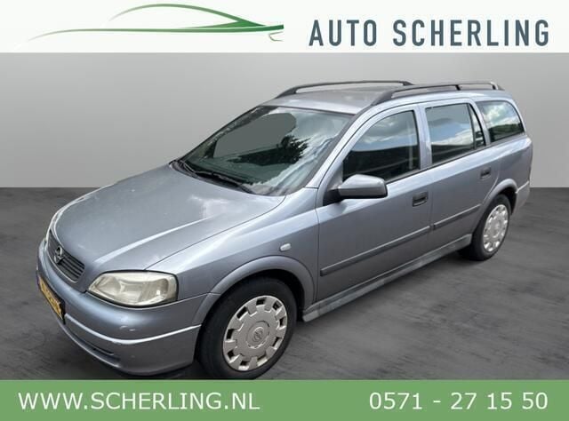 Grijs, metallic lak Gebruikt 2004 Opel Astra Essentia Stationwagen | € 795 (Goede deal) - Afbeelding 1/4