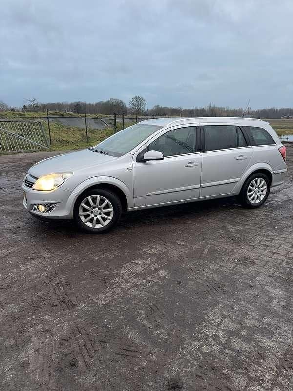 Occasion Opel Astra Cosmo 116 PK (85 kW) 2008 Grijs Stationwagen