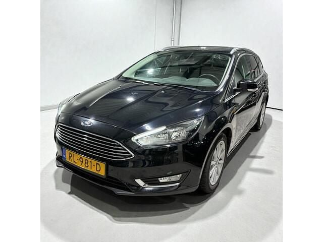 Zwart (metallic) Gebruikt 2017 Ford Focus Titanium Stationwagen | € 7.450 (Super prijs) - Afbeelding 1/4