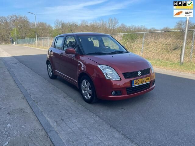 Oranje Gebruikt 2009 Suzuki Swift Hatchback | € 4.850 (Eerlijke prijs) - Afbeelding 1/4