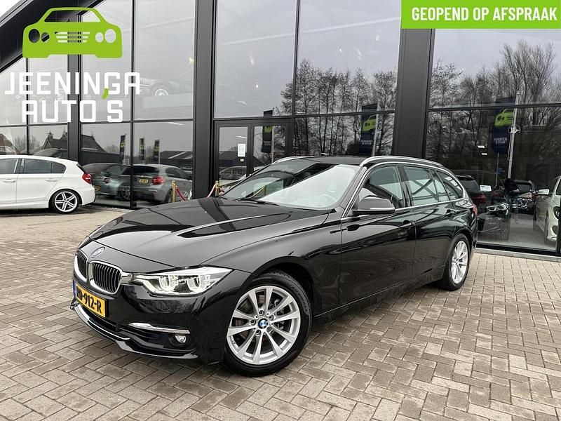 Zwart Occasion 2017 BMW 320 Executive Stationwagen | € 16.994 (Eerlijke prijs) - Afbeelding 1/4