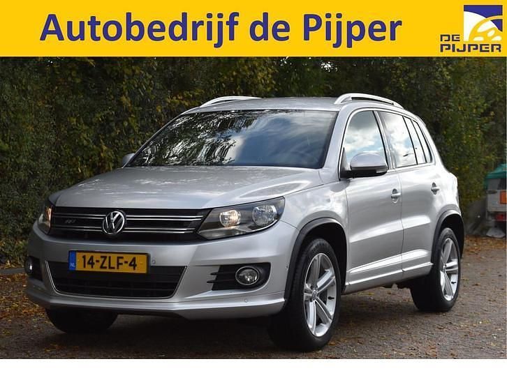Grijs Occasion 2013 VW Tiguan Sport SUV | € 13.950 (Iets duurder) - Afbeelding 1/3