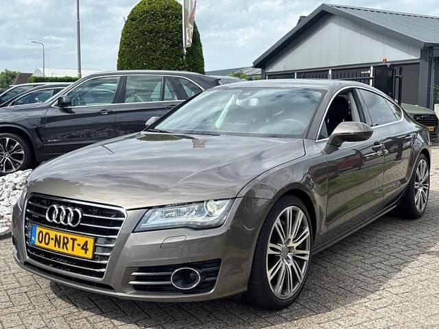Grijs Gebruikt 2011 Audi A7 Proline Hatchback | € 13.950 (Goede deal) - Afbeelding 1/4