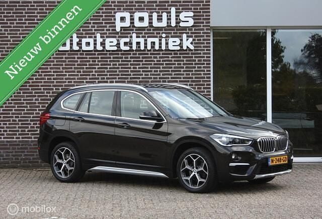 Bruin Gebruikt 2019 BMW X1 Executive SUV | € 22.850 (Eerlijke prijs) - Afbeelding 1/4