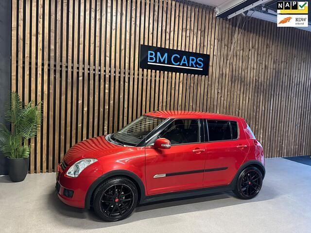 Rood Gebruikt 2009 Suzuki Swift Limited Hatchback | € 4.995 (Iets duurder) - Afbeelding 1/4