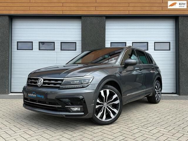 Grijs, metallic lak Gebruikt 2018 VW Tiguan R-line SUV | € 35.990 (Duur) - Afbeelding 1/4
