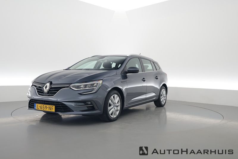Grijs Gebruikt 2021 Renault Mégane IV Business Stationwagen | € 20.845 (Goede deal) - Afbeelding 1/3