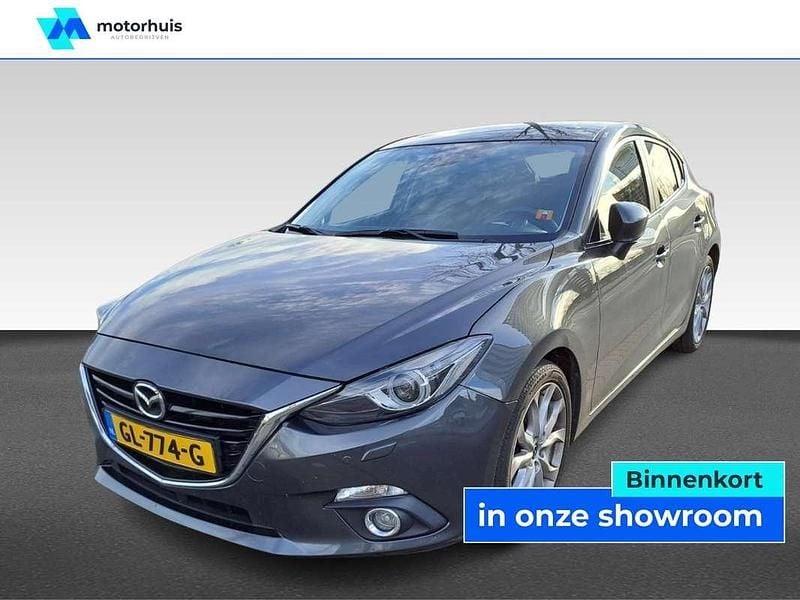 Grijs Gebruikt 2015 Mazda 3 Hatchback | € 12.945 (Eerlijke prijs) - Afbeelding 1/4