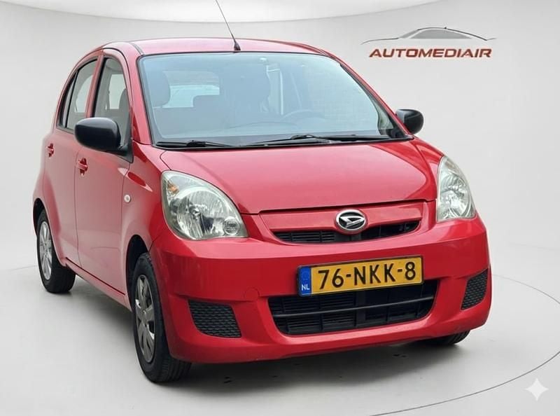 Occasion Daihatsu Cuore 69 PK (50 kW) 2010 Rood Hatchback