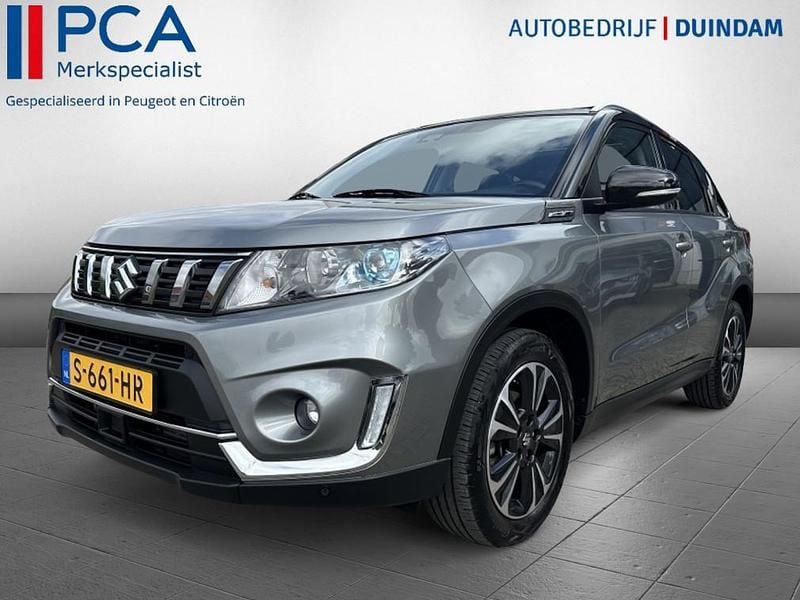 Grijs Gebruikt 2020 Suzuki Vitara SUV | € 22.450 (Eerlijke prijs) - Afbeelding 1/4