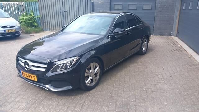 Zwart Gebruikt 2015 Mercedes C220 Prestige Sedan | € 13.995 (Eerlijke prijs) - Afbeelding 1/4