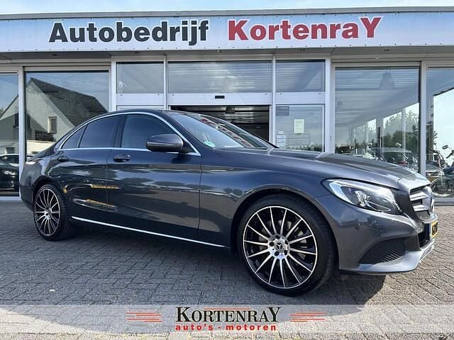 Grijs Gebruikt 2015 Mercedes C250 Ambition Sedan | € 17.250 (Eerlijke prijs) - Afbeelding 1/4