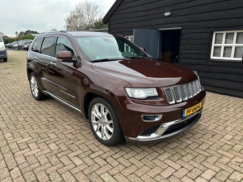 Bruin Occasion 2015 Jeep Grand Cherokee Summit SUV | € 12.750 (Super prijs) - Afbeelding 1/4
