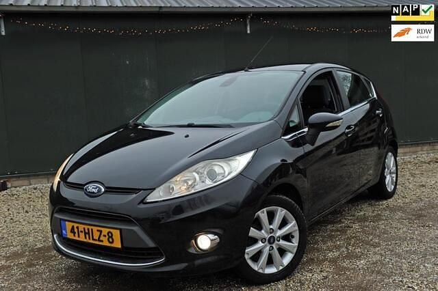 Zwart (metallic) Occasion 2009 Ford Fiesta Ghia Hatchback | € 5.495 (Eerlijke prijs) - Afbeelding 1/4