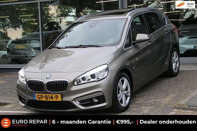 Grijs Gebruikt 2015 BMW 218 Active Tourer Luxury Line MPV | € 12.295 (Eerlijke prijs) - Afbeelding 1/4