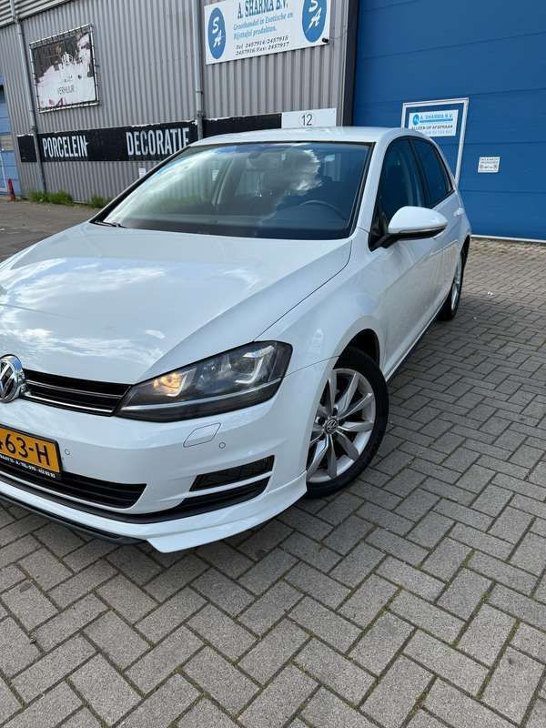 Wit Gebruikt 2014 VW Golf VII Highline Hatchback | € 9.350 (Super prijs) - Afbeelding 1/4
