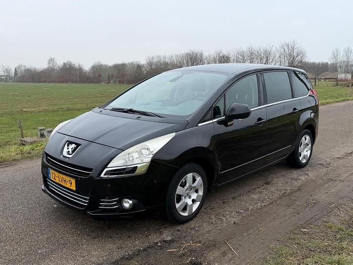 Zwart Occasion 2010 Peugeot 5008 MPV | € 1.950 (Duur) - Afbeelding 1/4