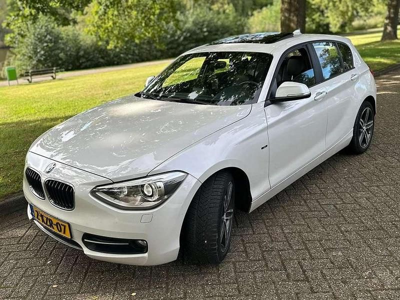 Wit Gebruikt 2013 BMW 114 Hatchback | € 7.000 (Eerlijke prijs) - Afbeelding 1/4