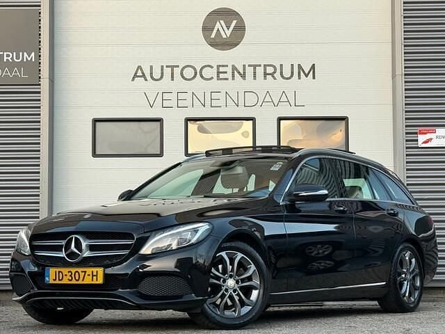 Zwart Gebruikt 2015 Mercedes C180 Prestige Stationwagen | € 11.950 (Goede deal) - Afbeelding 1/4