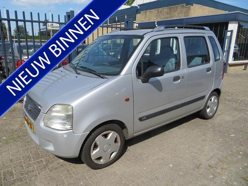 Grijs (metallic) Gebruikt 2002 Suzuki Wagon R+ GL Stationwagen | € 999 (Eerlijke prijs) - Afbeelding 1/4