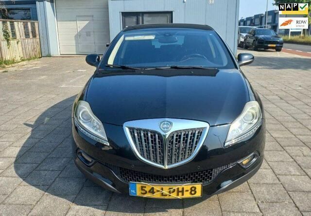 Zwart Gebruikt 2010 Lancia Delta Hatchback | € 4.295 (Iets duurder) - Afbeelding 1/4