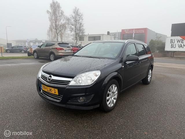 Zwart Gebruikt 2010 Opel Astra Cosmo Stationwagen | € 2.950 (Goede deal) - Afbeelding 1/4
