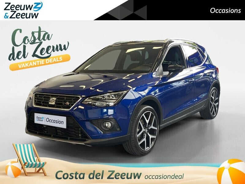 Mystery blue met zwart dak Gebruikt 2020 Seat Arona Business SUV | € 19.940 (Eerlijke prijs) - Afbeelding 1/4