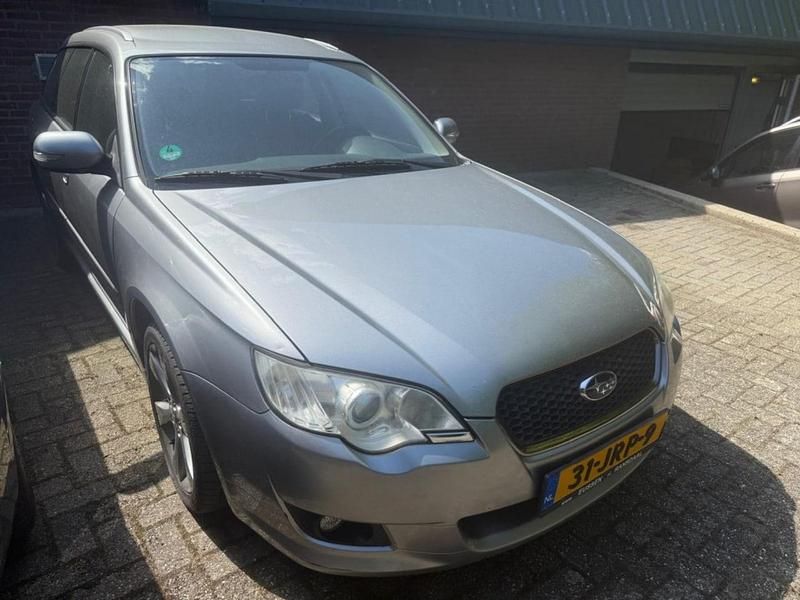 Grijs Occasion 2009 Subaru Legacy Exclusive+ Stationwagen | € 1.690 (Eerlijke prijs) - Afbeelding 1/4