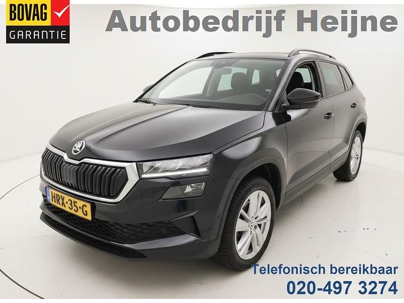 Zwart (metallic) Gebruikt 2024 Skoda Karoq Elegance SUV | € 33.445 (Eerlijke prijs) - Afbeelding 1/4