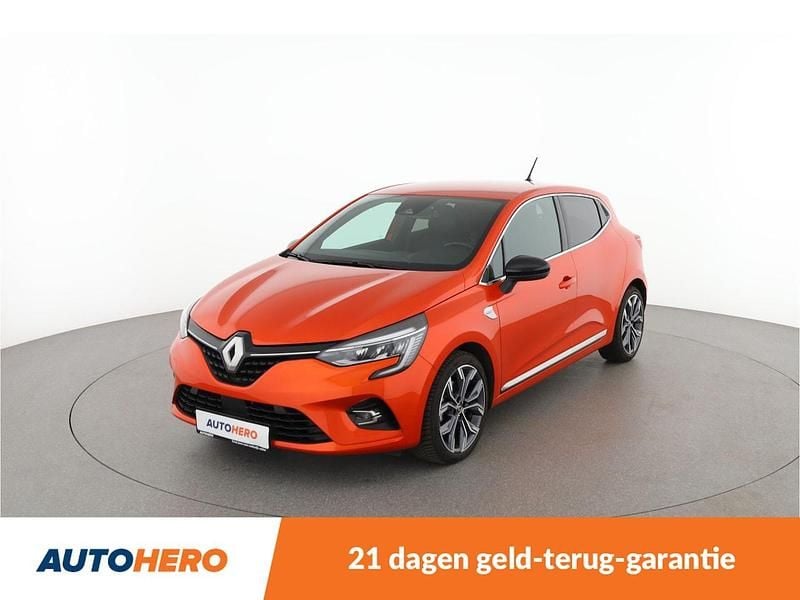 Oranje (metallic) Gebruikt 2020 Renault Clio V Initiale Paris Hatchback | € 16.749 (Super prijs) - Afbeelding 1/4