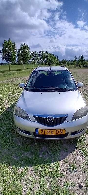Grijs Gebruikt 2004 Mazda 2 Exclusive Stationwagen | € 1.400 (Eerlijke prijs) - Afbeelding 1/4