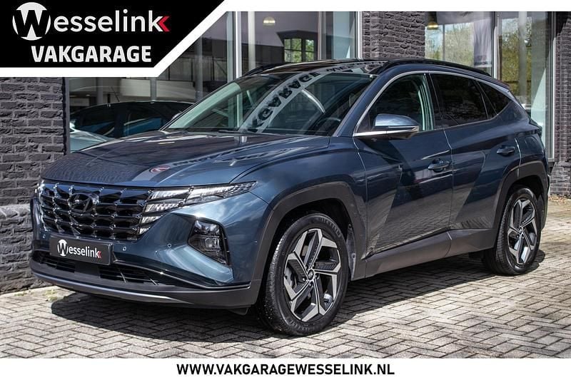 Grijs, metallic lak Gebruikt 2022 Hyundai Tucson Premium SUV | € 32.950 (Eerlijke prijs) - Afbeelding 1/4