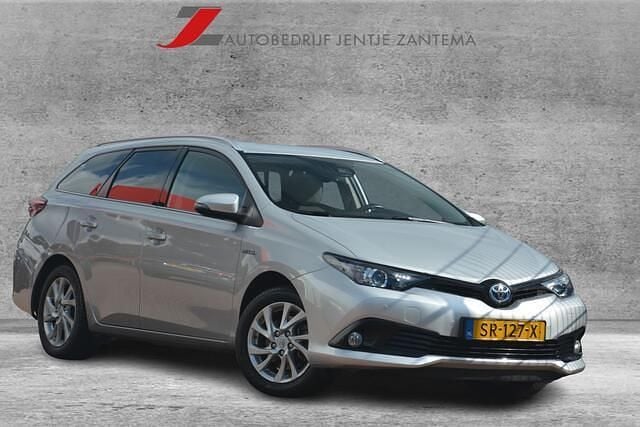 Grijs, metallic lak Gebruikt 2018 Toyota Auris Touring Sports Stationwagen | € 14.950 (Eerlijke prijs) - Afbeelding 1/4