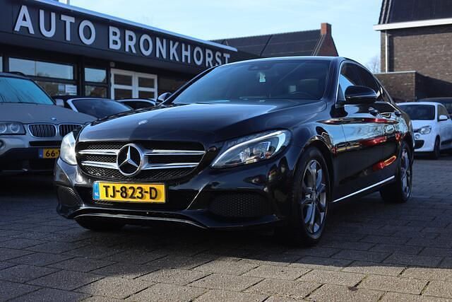 Zwart (metallic) Occasion 2017 Mercedes C180 Business Sedan | € 19.950 (Super prijs) - Afbeelding 1/4