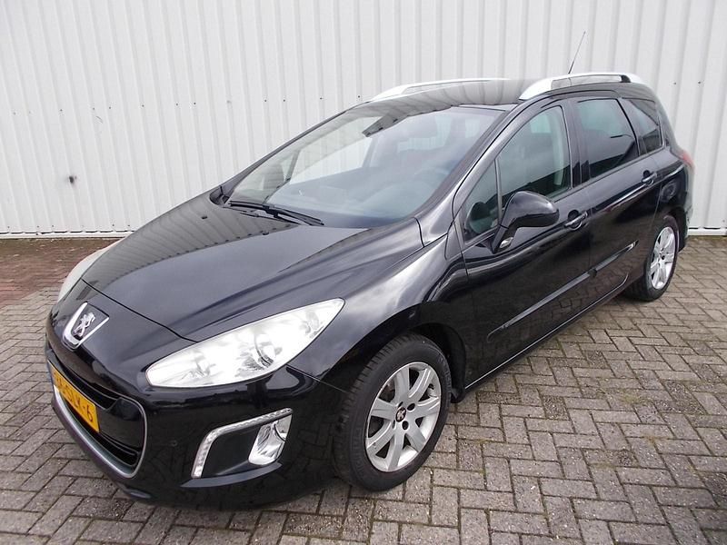 Zwart Occasion 2011 Peugeot 308 Stationwagen | € 2.950 (Iets duurder) - Afbeelding 1/4