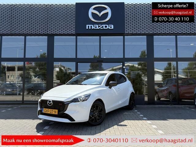 Snowflake white pearl metallic (licht wit) Gebruikt 2024 Mazda 2 Homura-Line Hatchback | € 21.750 (Eerlijke prijs) - Afbeelding 1/4