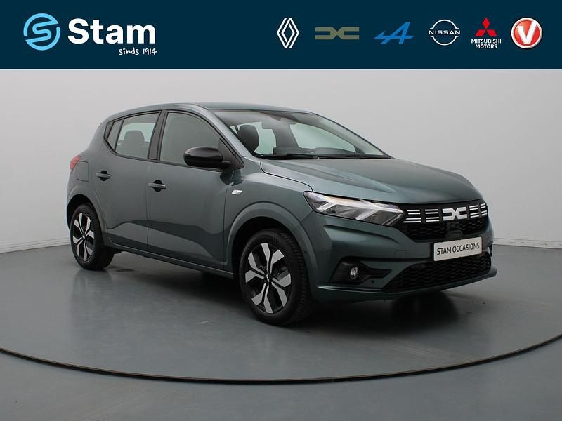 Groen (metallic) Gebruikt 2024 Dacia Sandero Journey Hatchback | € 18.990 (Eerlijke prijs) - Afbeelding 1/4