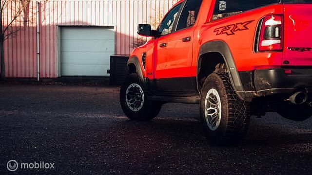Occasion Dodge Ram 711 PK (522 kW) 2021 Rood Pickup