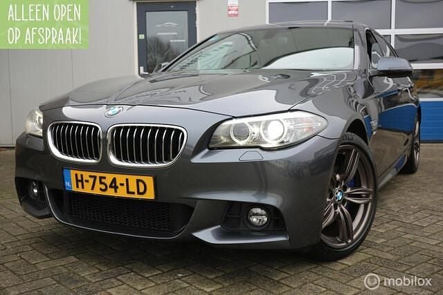 Grijs Occasion 2015 BMW 530 M Sport Stationwagen | € 12.700 (Goede deal) - Afbeelding 1/4