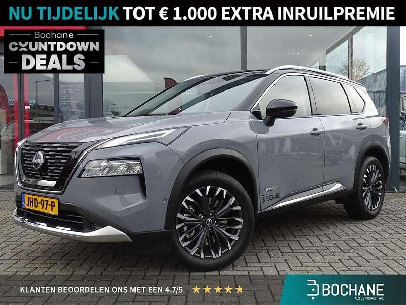 Ceramic grey & black metallic Occasion 2025 Nissan X-Trail Tekna+ SUV | € 51.900 - Afbeelding 1/4