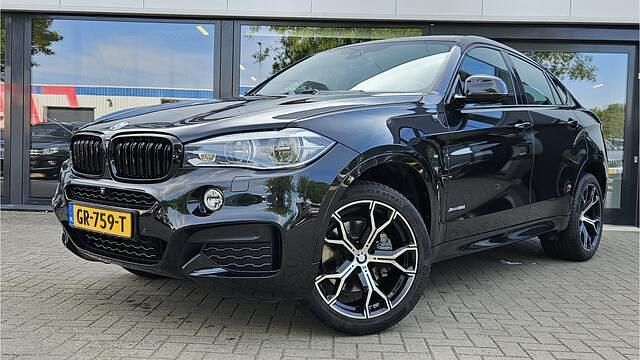 Zwart Gebruikt 2015 BMW X6 Executive SUV | € 36.900 (Eerlijke prijs) - Afbeelding 1/4