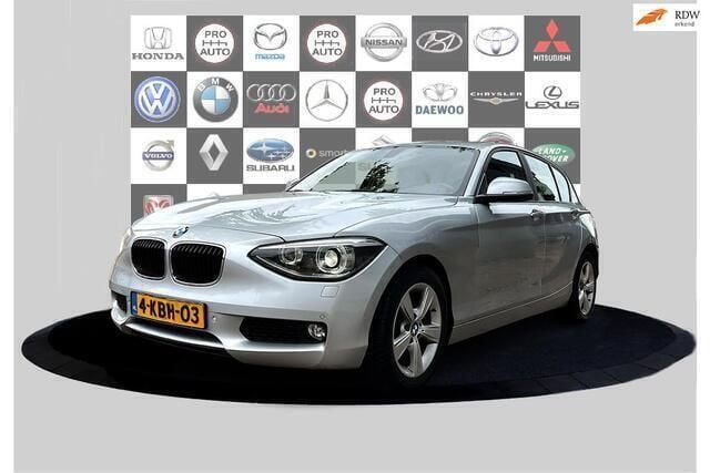 Grijs Gebruikt 2013 BMW 118 Comfort Edition Hatchback | € 7.440 (Eerlijke prijs) - Afbeelding 1/4