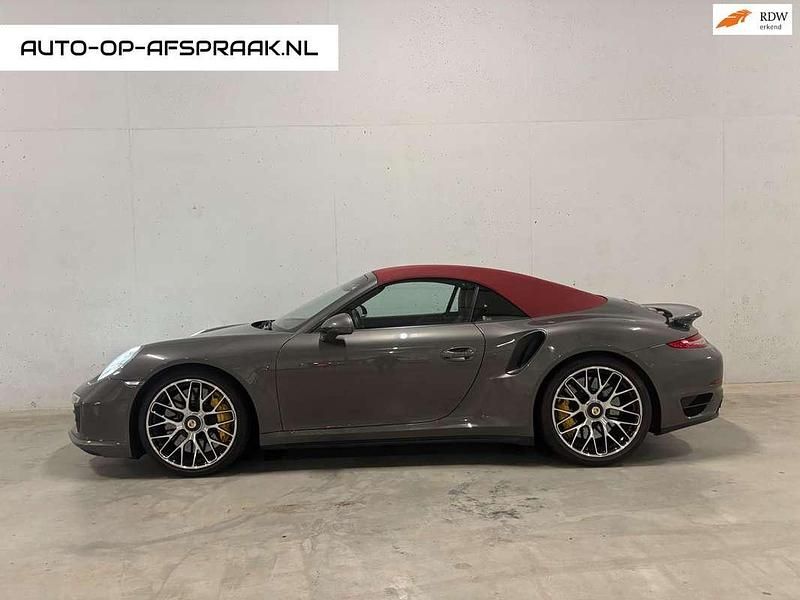 Grijs, metallic lak Gebruikt 2014 Porsche 911 Turbo S Cabriolet Cabriolet | € 119.911 - Afbeelding 1/4
