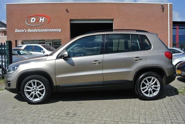Geel Gebruikt 2012 VW Tiguan Sport SUV | € 8.799 (Goede deal) - Afbeelding 1/4